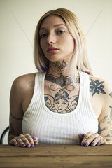 Tattooed woman with attitude  portrait