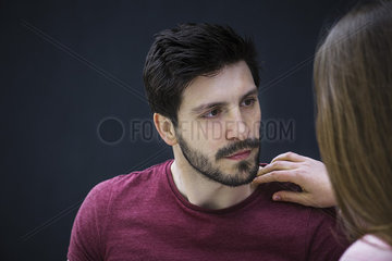Couple engaging in serious conversation