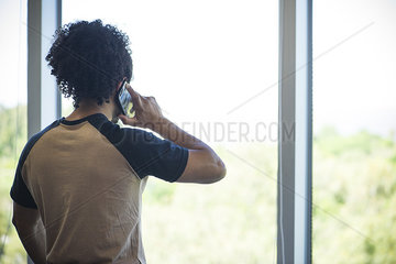 Man enjoying view while taking phone call