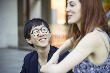Man looking at female friend