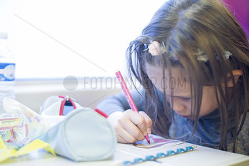 Little girl coloring