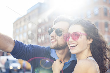 Couple sightseeing in city together