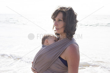 Mother wearing baby in wrap