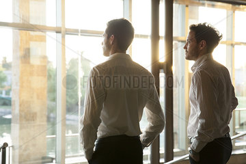 Business partners contemplating future together