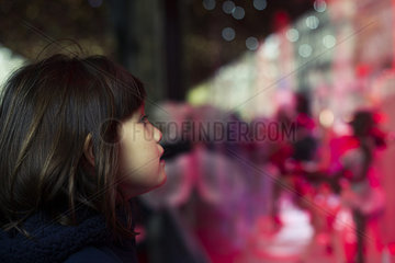 Little girl window shopping