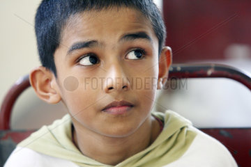 Kundasale  Sri Lanka  Gesichtsausdruck eines Jungen
