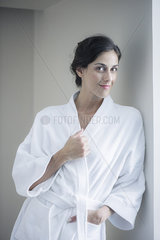 Woman relaxing in bathrobe  portrait