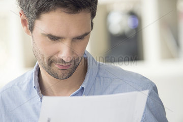 Man reading letter