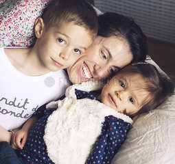 Mother with young children  portrait