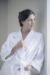 Woman relaxing in bathrobe