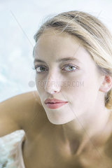 Woman soaking in spa  portrait