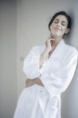 Woman relaxing in bathrobe