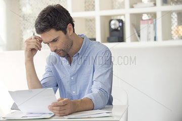 Man frustrated by mounting debt