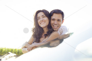 Couple embracing while enjoying view together