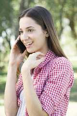 Woman receiving phone call with good news