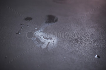 Wet footprints on floor