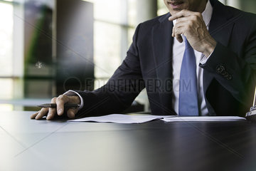 Lawyer preparing to write letter by hand