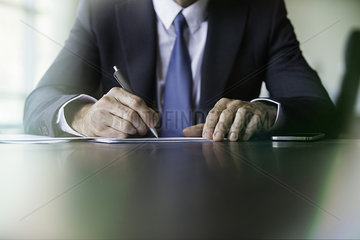 Businessman doing paperwork