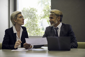 Woman and man meeting in office