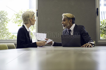 Man and woman meeting in office