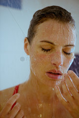 Woman showering  close-up