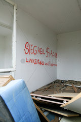 Borna  Deutschland  zerstoertes Geschaeftsgebaeude mit Graffito