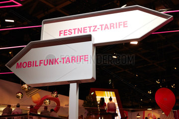 Berlin  Deutschland - Zwei Hinweisschilder mit den Hinweisen auf Festnetz-Tarife und Mobilfunk-Tarife am Messestand der Deutschen Telekom auf der IFA 2018.
