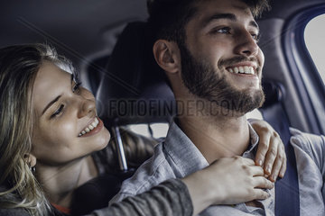 Couple traveling in car