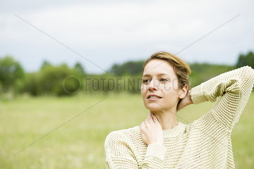Woman massaging neck