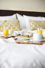 Breakfast trays on bed