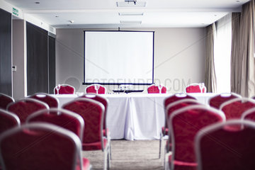 Empty conference room with projection screen