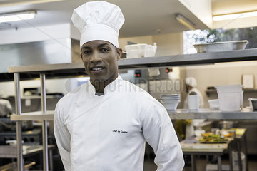 Chef in commercial kitchen  portrait