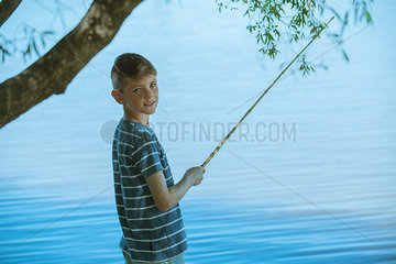 Boy fishing  portrait