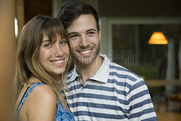 Young couple smiling cheerfully  portrait