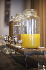 Juice and other beverages in glass dispensers