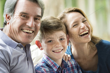 Family smiling together  portrait