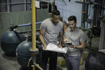 Men working in industrial setting