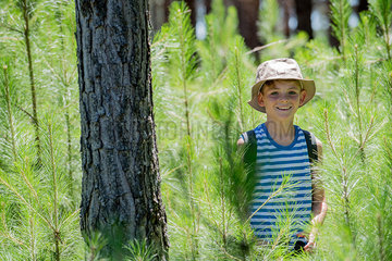Boy hiking in woods  portrait