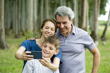 Family posing for selfie