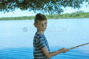 Boy fishing  portrait