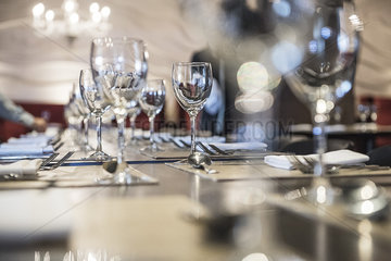 Wineglasses on set table