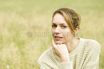 Woman contemplating  portrait