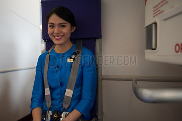 Singapur  Republik Singapur  eine Flugbegleiterin der Thai Airways