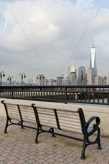 Park bench with scenic view of Lower Manhattan  New York City  New York  USA