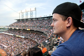 Man watching sports match in stadium