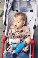 Toddler sleeping in stroller