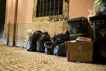 Garbage at side of building