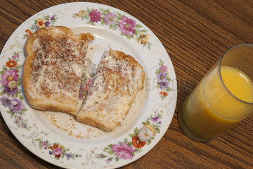 Buttered toast and orange juice