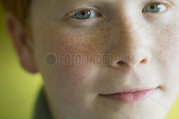 Boy with freckles  close-up portrait