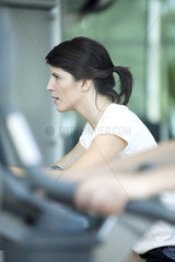Woman working out in fitness club